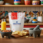 A delicious bowl of organic beef tallow tortilla chips served with guacamole, showcasing the benefits of organic beef tallow tortilla chips as a healthy snack option.